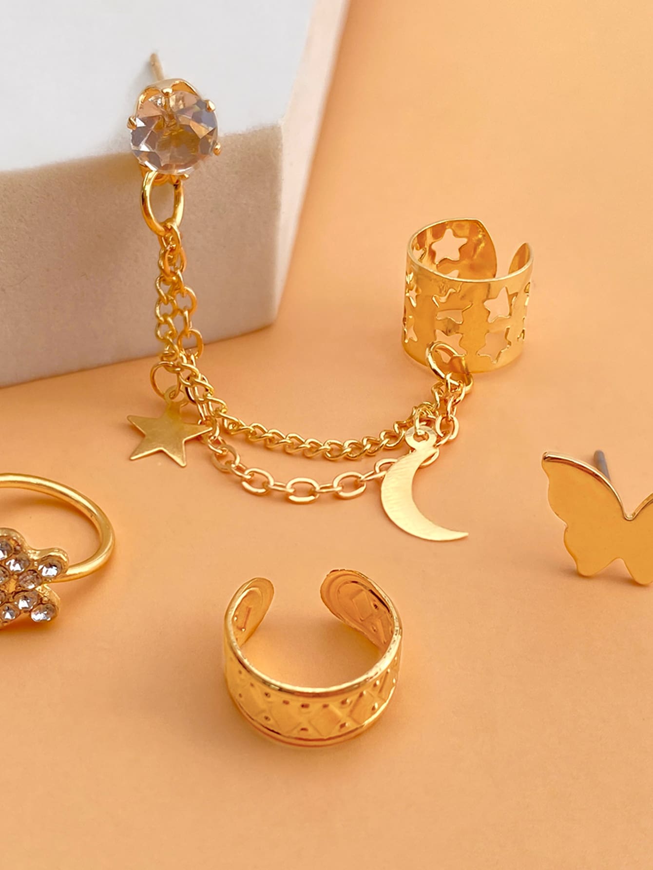 4 pièces Boucles d'oreilles décorées de strass en forme d'étoile et de papillon