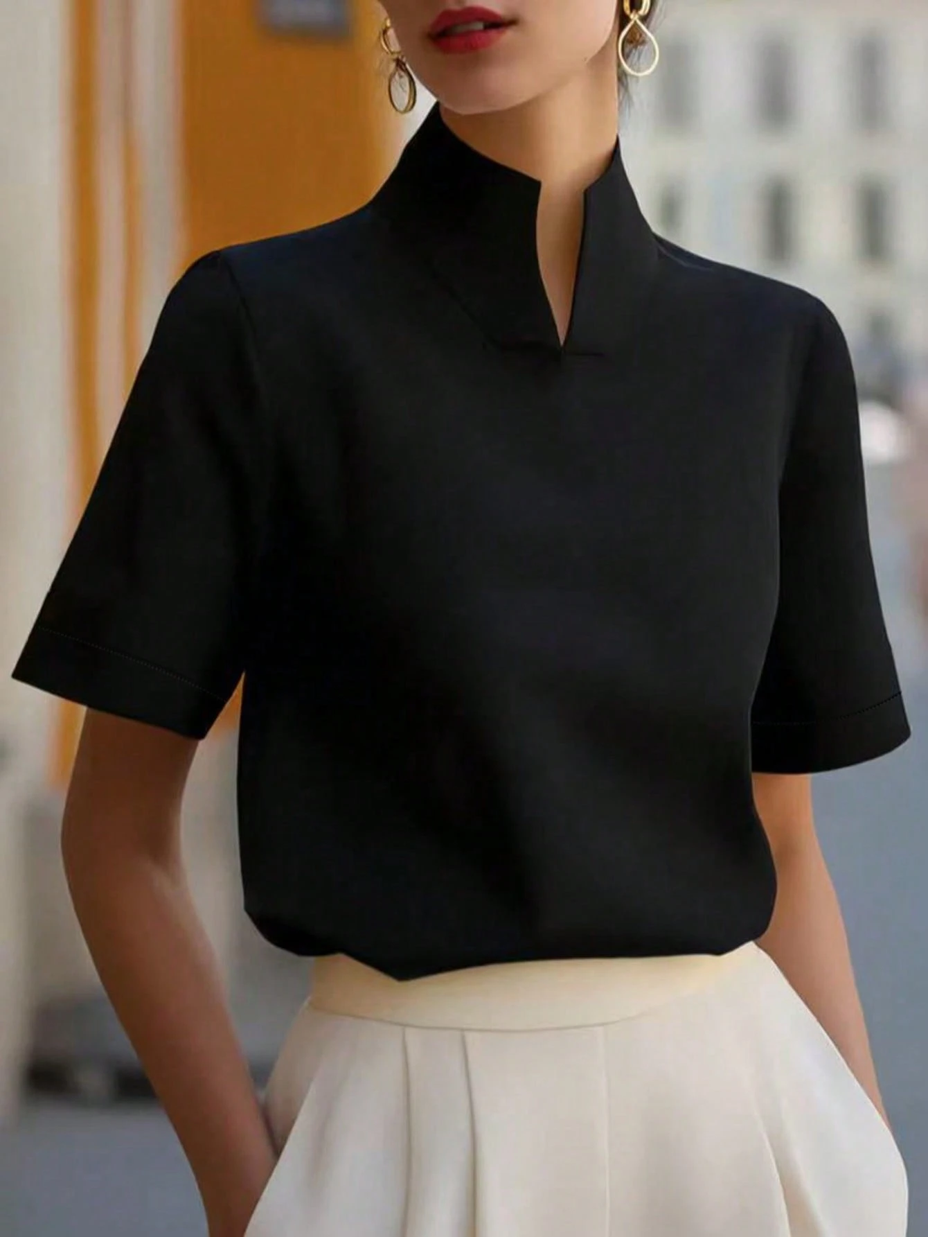 Blouse élégante pour femme à col chinois, manches courtes, couleur abricot, tricot côtelé